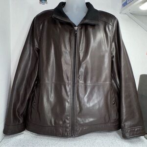 Calvin Klein XL men’s stylish Vegan leather jacket, lined with famous Ck logo.